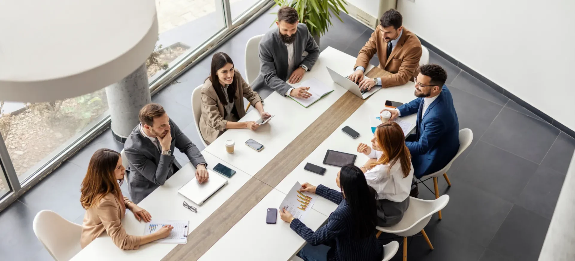 AdobeStock_1500172061 executive leadership team discussing governance and risk strategy