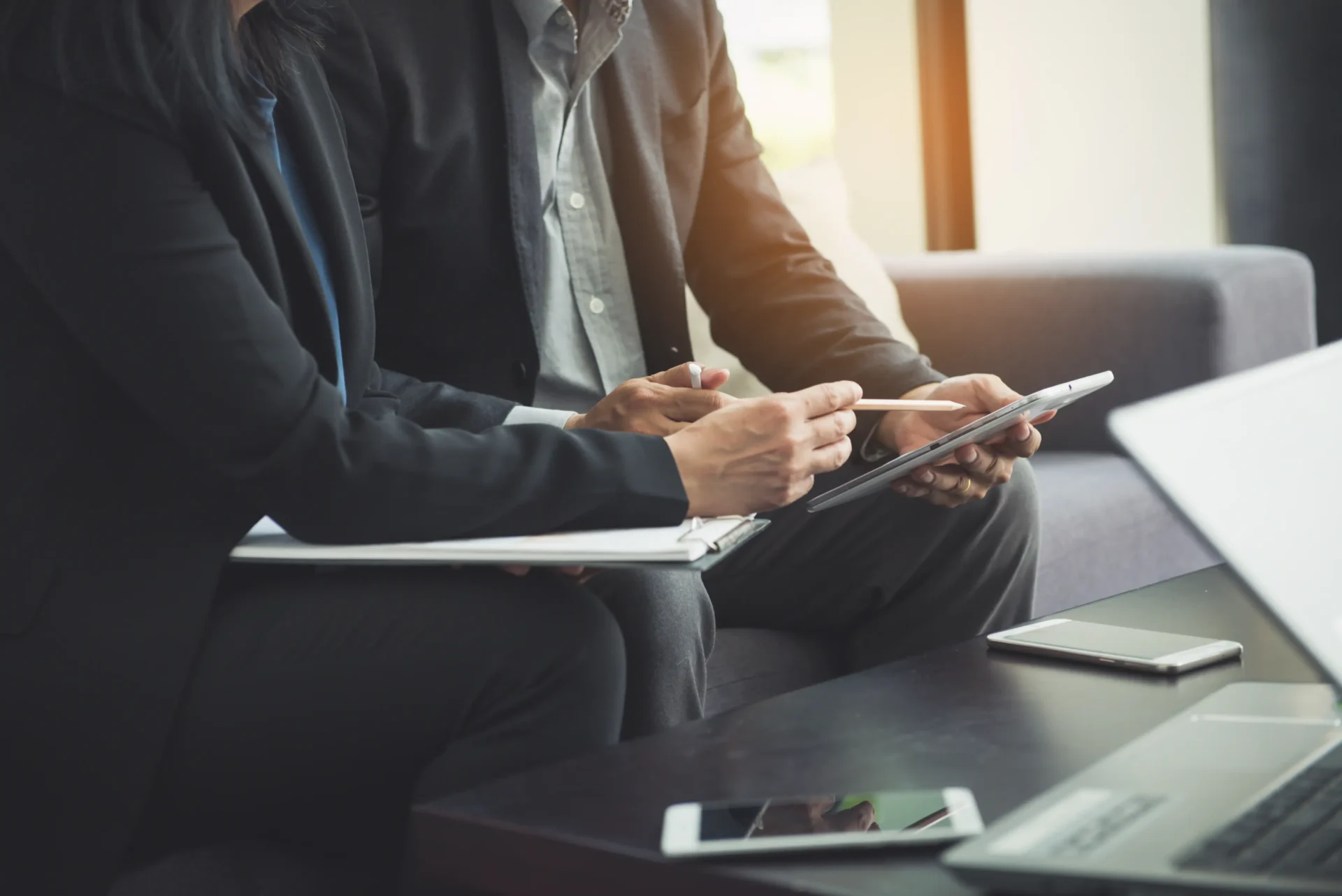 team-work-process-young-business-managers-crew-working-with-new-startup-project-labtop-wood-table-typing-keyboard-texting-message-analyze-graph-plans business professional reviewing governance and risk strategy on laptop